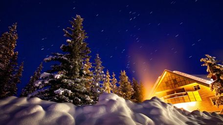 Cozy Winter Night at a Snowy Cabin wallpaper