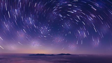 Spiral star trails wallpaper