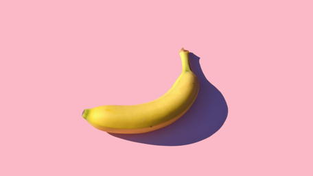 Single Banana on Pink Background wallpaper