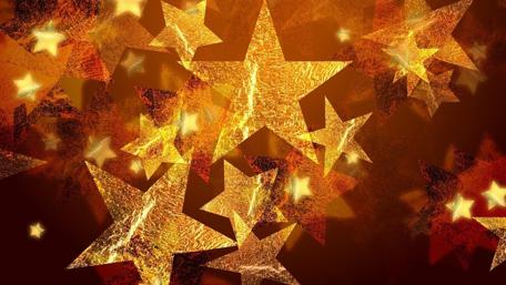 Twinkling Golden Christmas Stars wallpaper