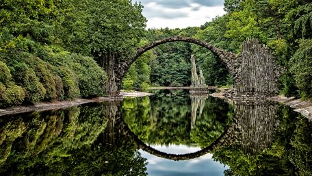 Enchanted Bridge in Serene Park wallpaper