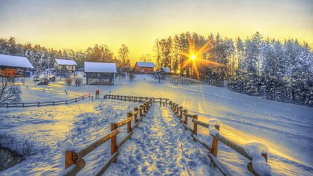 Footpath to a snowy village wallpaper
