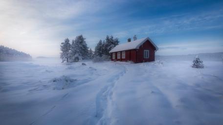 Snowy house in Norway wallpaper
