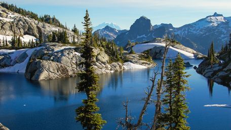 Majestic Winter Mountain Reflections wallpaper