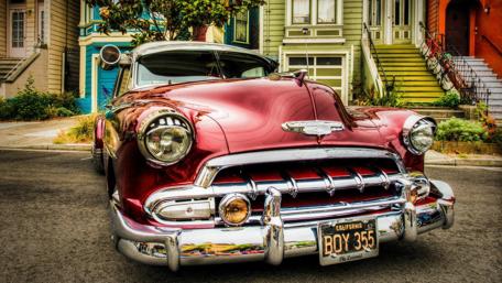 Classic Chevrolet Vintage Car on a Charming Street Scene wallpaper