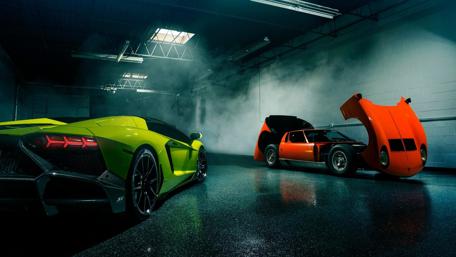 Luxury Supercars in a Garage Showcase wallpaper
