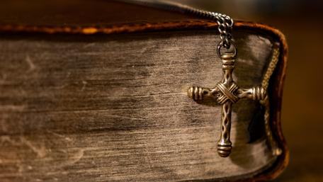 Bible with silver cross wallpaper