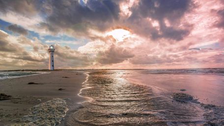 Lighthouse on the beach wallpaper