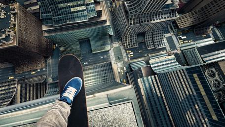 Skateboarding High Above the Metropolis wallpaper