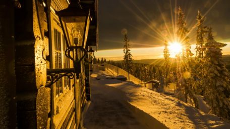 Winter Sunset Embracing the Snowy Landscape wallpaper