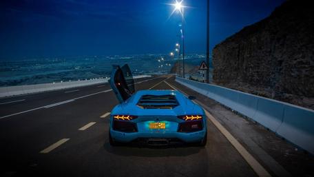 Dream Blue Lamborghini on a Night Roadscape wallpaper