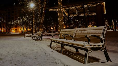 Snowy bench at Christmas season wallpaper