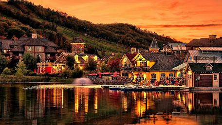 Lakeside village at sunset wallpaper