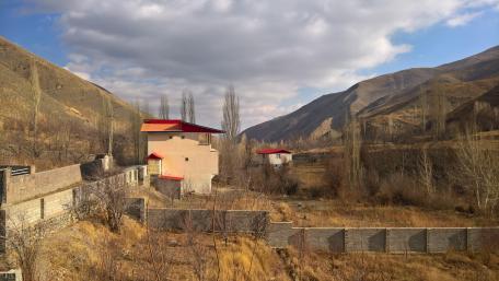 Serene Village Under Damavand Mountain Sky wallpaper