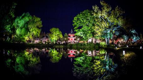 Illuminated Chinese Garden reflection wallpaper
