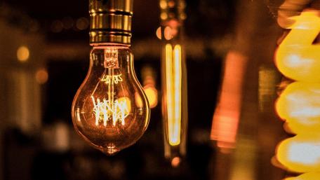 Warm Vintage Bulb Glow for Modern Spaces wallpaper