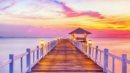 Serene Sunrise Over Tranquil Pier wallpaper