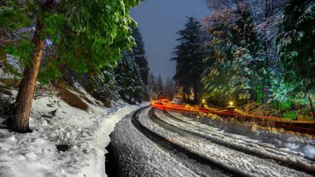 Winter road light trails wallpaper