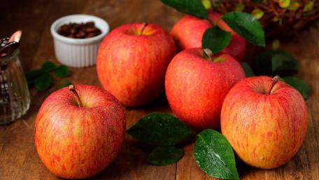 Fresh Apples on Rustic Wooden Table wallpaper