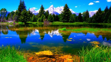 Serene Mountain Reflection Over Tranquil Lake wallpaper