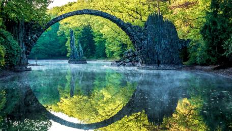 Serene Reflection at Kromlau's Devils Bridge wallpaper