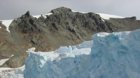 Majestic Glacier Against Rugged Mountain Landscape wallpaper