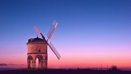 Enchanting Windmill at Dusk with Pink Sky wallpaper