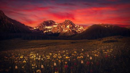 Majestic Evening Glow Over Mountain Landscape wallpaper