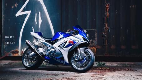 Suzuki Motorcycle in Urban Setting wallpaper