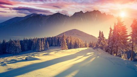 Winter Sunrise Over Serene Mountain Landscape wallpaper