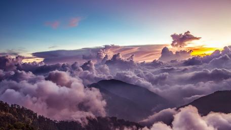 Majestic Sunrise Over Mountain Peaks wallpaper