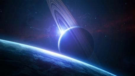 Majestic Ringed Planet Overlooking a Distant World wallpaper