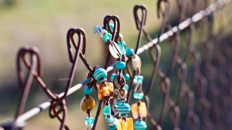 Necklace on the fence wallpaper