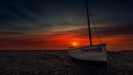 Sailboat in the sunset wallpaper