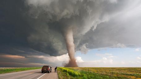 Tornado and a daring storm chaser wallpaper