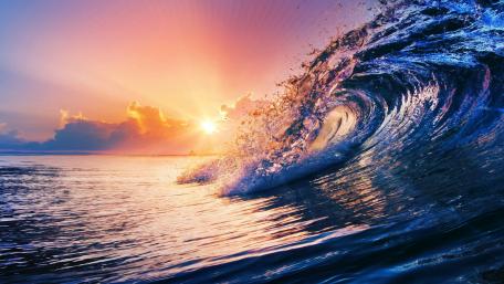 Majestic Ocean Wave at Sunset wallpaper