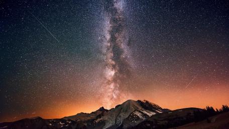 Milky Way Splendor Over Majestic Mountains wallpaper