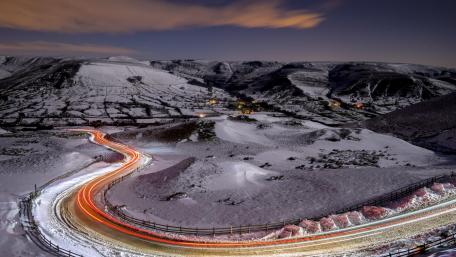 Winding Road Through Winter Wonderland wallpaper