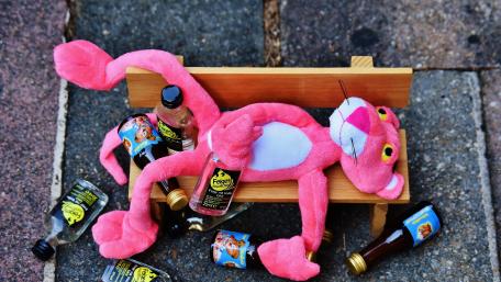 Drunken Pink Panther on a bench wallpaper