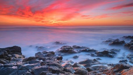 Serene Dawn Over Misty Shores wallpaper