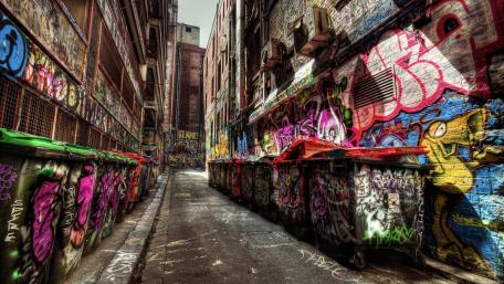 Urban Alleyway Vibrancy in Colorful Graffiti Art wallpaper