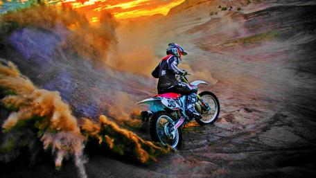 Sunset Ride on Rugged Terrain wallpaper