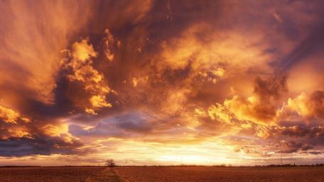 Vibrant Sunset Over Prairie Horizon wallpaper