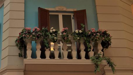Charming Balcony with Floral Accents wallpaper