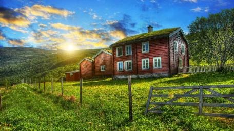 Country house with grass roof wallpaper