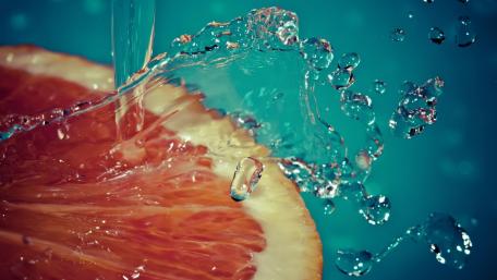 Waterdrops on orange wallpaper