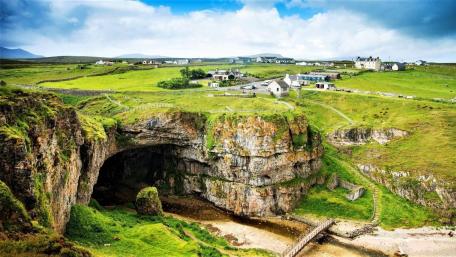 Scottish countryside and the Smoo Cave wallpaper