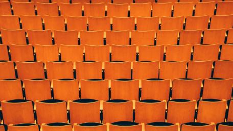 Vibrant Orange Seating Arrangement for Modern Spaces wallpaper