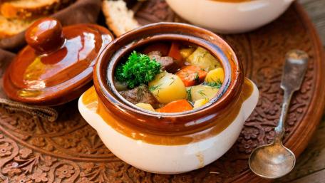 Hearty Vegetable Soup in a Rustic Pot wallpaper