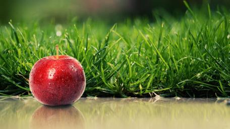 Waterdrops on an apple wallpaper
